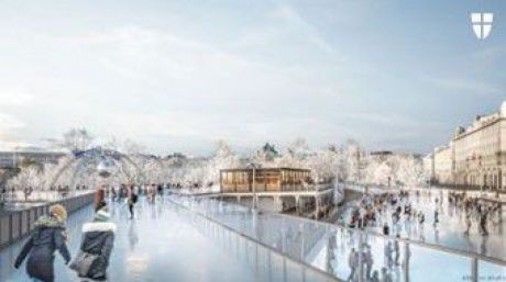 Eisfläche mit zwei Eisläuferinnen im Vordergrund.
